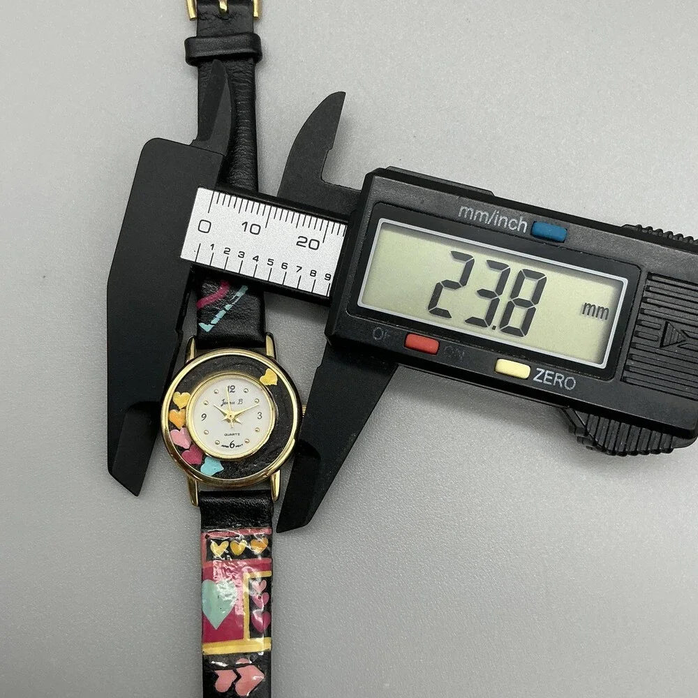 Jennie B Women Watch 24mm White Dial Black Hearts Design Band Gold Tone New Batt